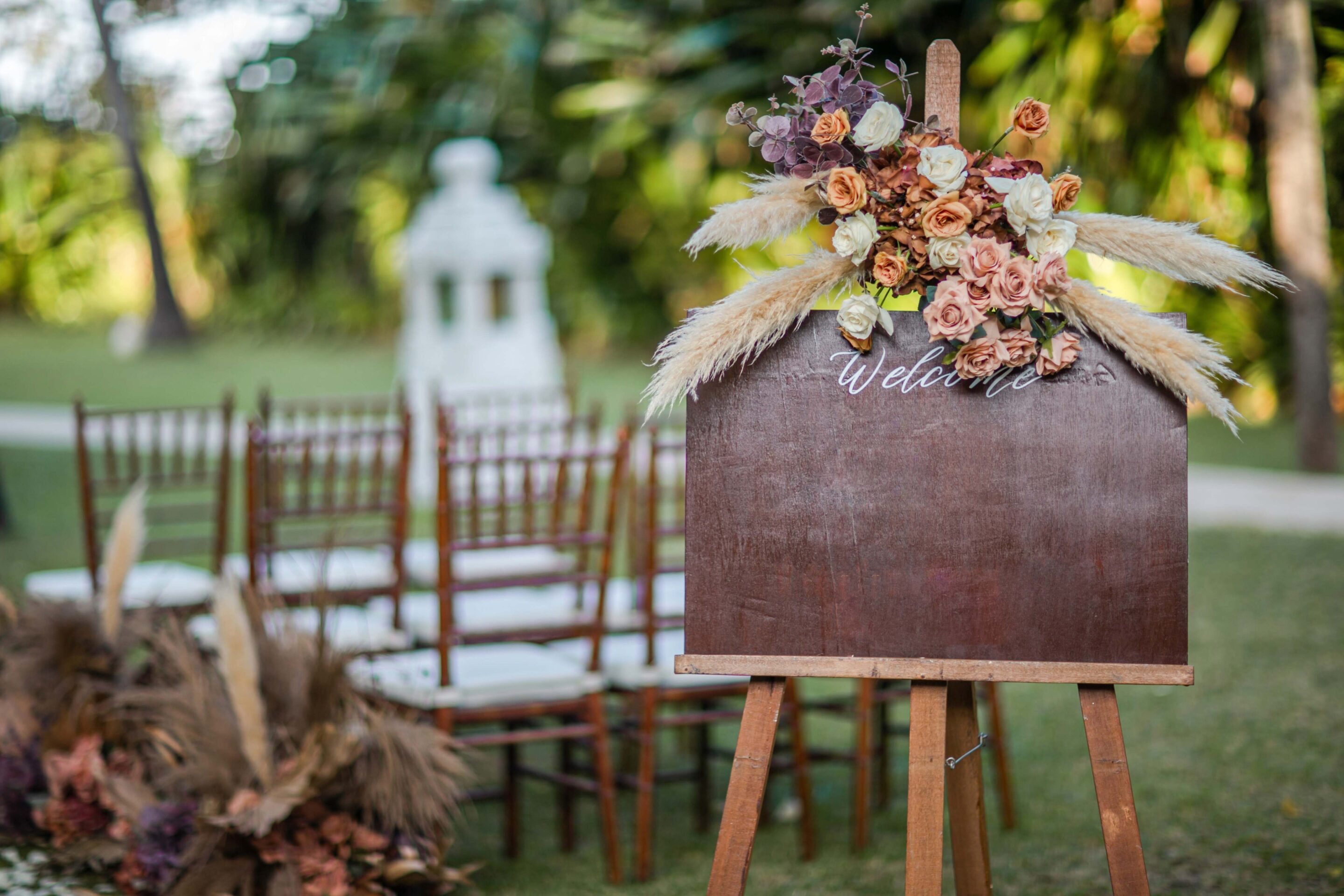 rural wedding welcome sign with florals